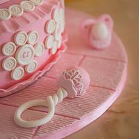 Pink and white birthday cake 