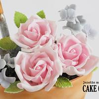 Stacked flower pots birthday cake