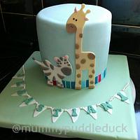 Baby's first birthday zebra and giraffe cake 