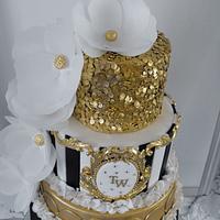 Black and white with gold sequins.