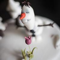Olaf sniffing flower