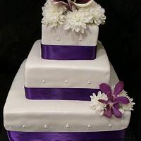 3 Tiered Purple Wedding Cake with Fresh Flowers