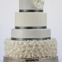 Silver and white ruffle wedding cake