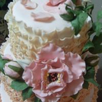 Ombre ruffle wedding cake with sugar paste peonies and roses