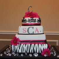 Hot pink and animal print wedding cake
