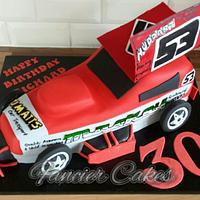 Stock car birthday cake - cake by Fancier Cakes - CakesDecor