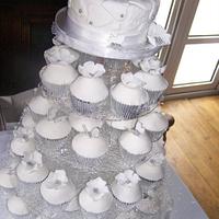 White Wedding cake and cupcakes 