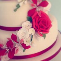 Red Rose, Freesia and Alstromeria Cascade Wedding Cake