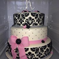 Cake with damask stencil large K with rhinestone and bow