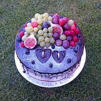 Chocolate wedding cake with fresh fruits