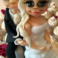 Bride & Groom on Cream & Burgundy Wedding Cake