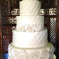 Ivory Roses and Pleats Wedding Cake