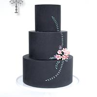Chalk board cake with hand painted flowers, leaves with sugar flower