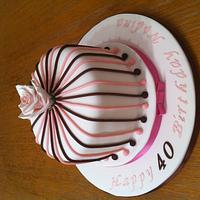 stripy cake with rose topper
