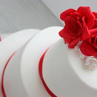 wedding cake red flowers