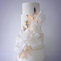 Cascading wafer paper roses and gold leaf wedding cake 