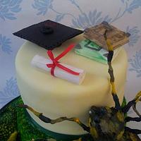 Reptile themed Graduation cake