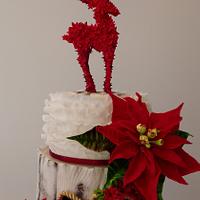 Christmas cake with poinsettias and a reindeer ... 
