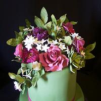 Green cake and sugar flowers