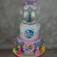 Princesses and Elsa Snow globe cake