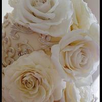 White sugar rosé wedding cake 