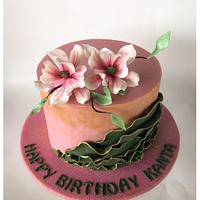 Coloured ganache cake with sugar flowers 