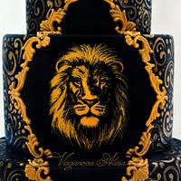gold and black cake with lion