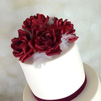 Red velvet Roses and White feathers