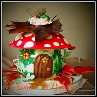 Mushroom house with sleeping fairy cake