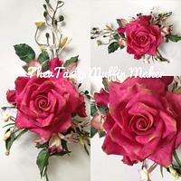 Roses,jasmine,pearl succulents,cymbiduim orchid and foliage.
