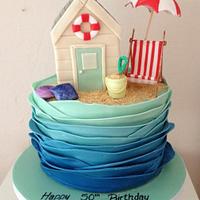  A beach hut themed cake