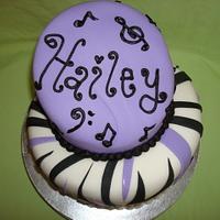 Musical topsy turvy cake