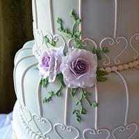 Roses and cage wedding cake