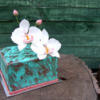 Orchids, turquoise and rust