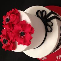 Big red flowers and black stencil cake
