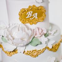 Mint and gold wedding cake