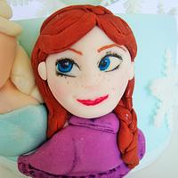 Frozen cake with Beauty and the Beast cupcakes