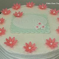 Peach and mint green baby shower cake