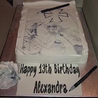 Sketch pad cake with drawing pencils and crumpled piece of paper
