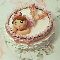 Ballerina resting on her tutu cake