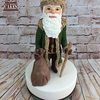 A Victorian Christmas modelled figure