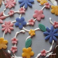 Blueberry cake with fondant flowers and royal icing