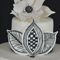 Black and White Cake with Lotus and Mehndi design Leaves
