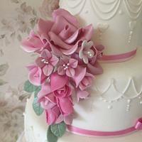 Pink flower spray with hand piped detail