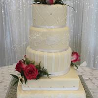 WHITE AND HOT PINK ILLUSION WEDDING CAKE
