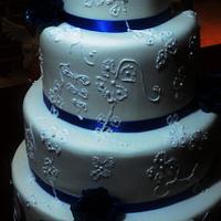 Classic 4-Tier White and Blue Wedding Cake