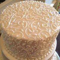 Piped vine wedding cake