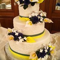 Green, yellow, blue wedding cake