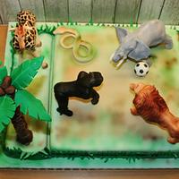 Jungle animals playing soccer