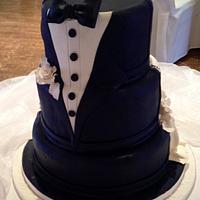 Wedding dress and tuxedo cake
